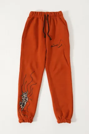 "ENLIGHTENMENT" RUST SWEATPANTS